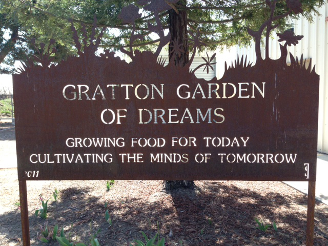 A sign that reads "Gratton Garden of Dreams"